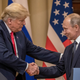 U.S. President Donald Trump and Russian President Vladimir Putin shake hands on July 16, 2018 during a meeting in Finland